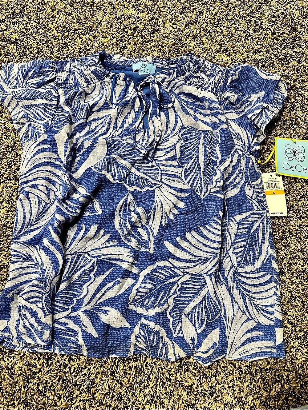 CeCe Island Time Smocked Flutter Sleeve Blouse Floral Blouse in Blue & White